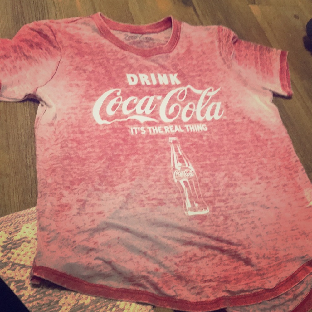 A Coca Cola shirts